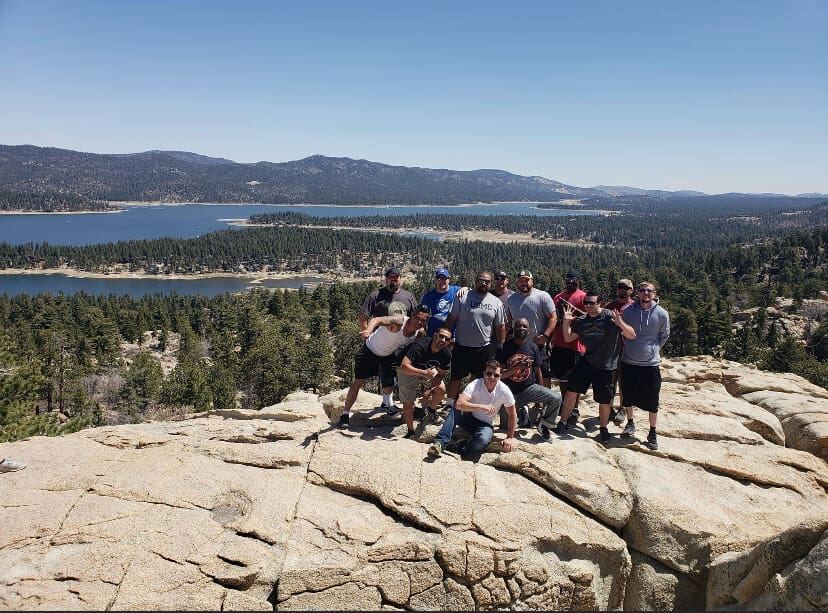 The boys on the granite overlook above Big Bear Lake