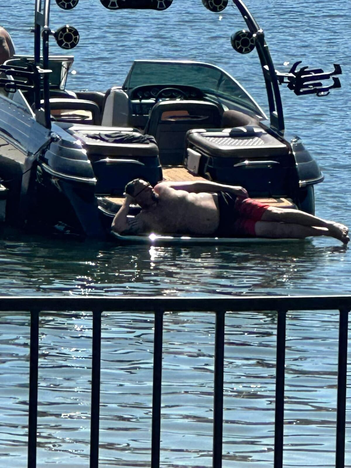 Earned rest — floating off the swim deck on a hot afternoon