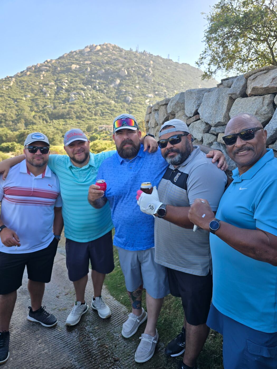 Brothers cracking cold ones with the mountain at our backs