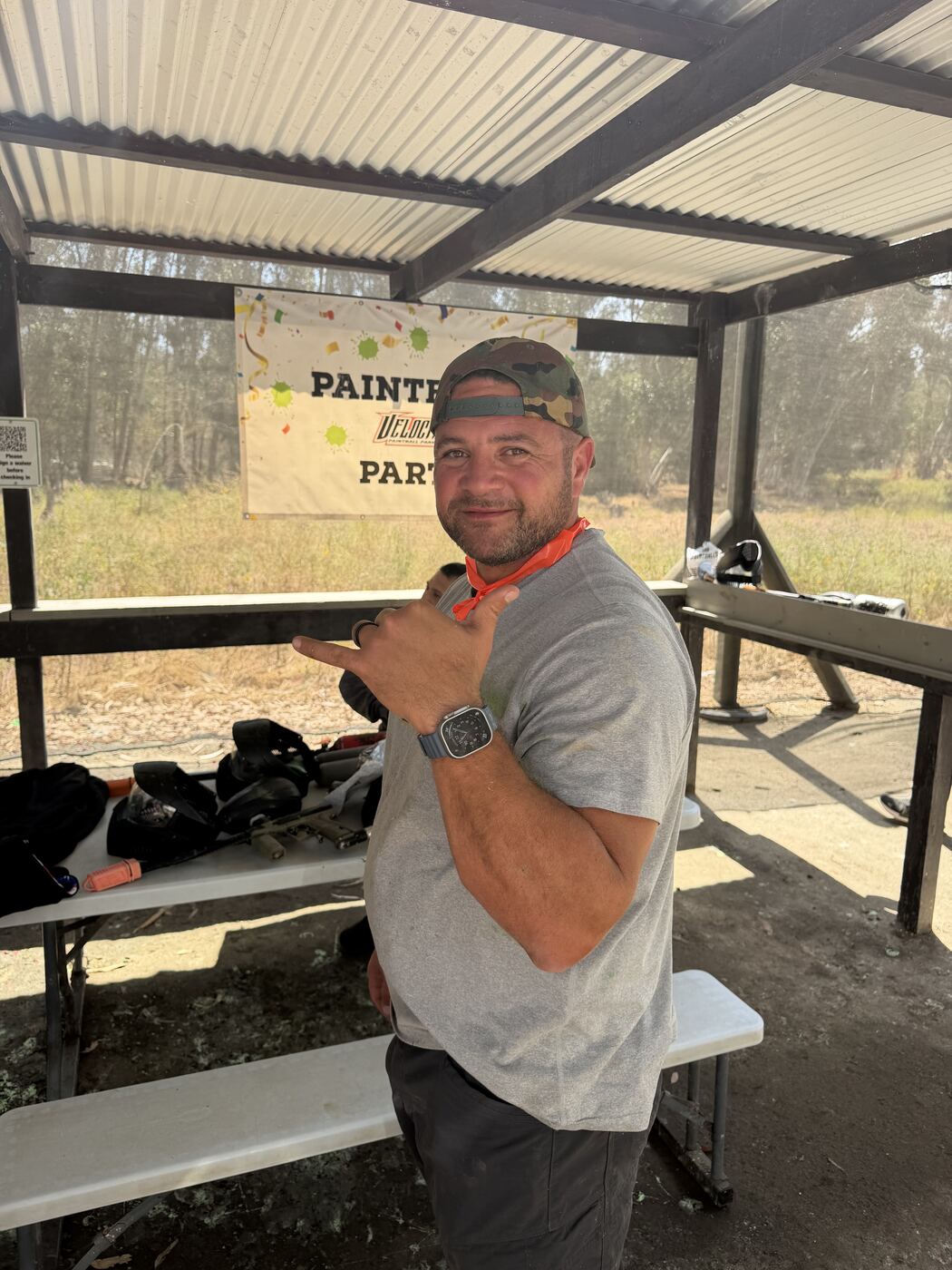 Shaka up after a clean run — paint on the shirt, peace on the face