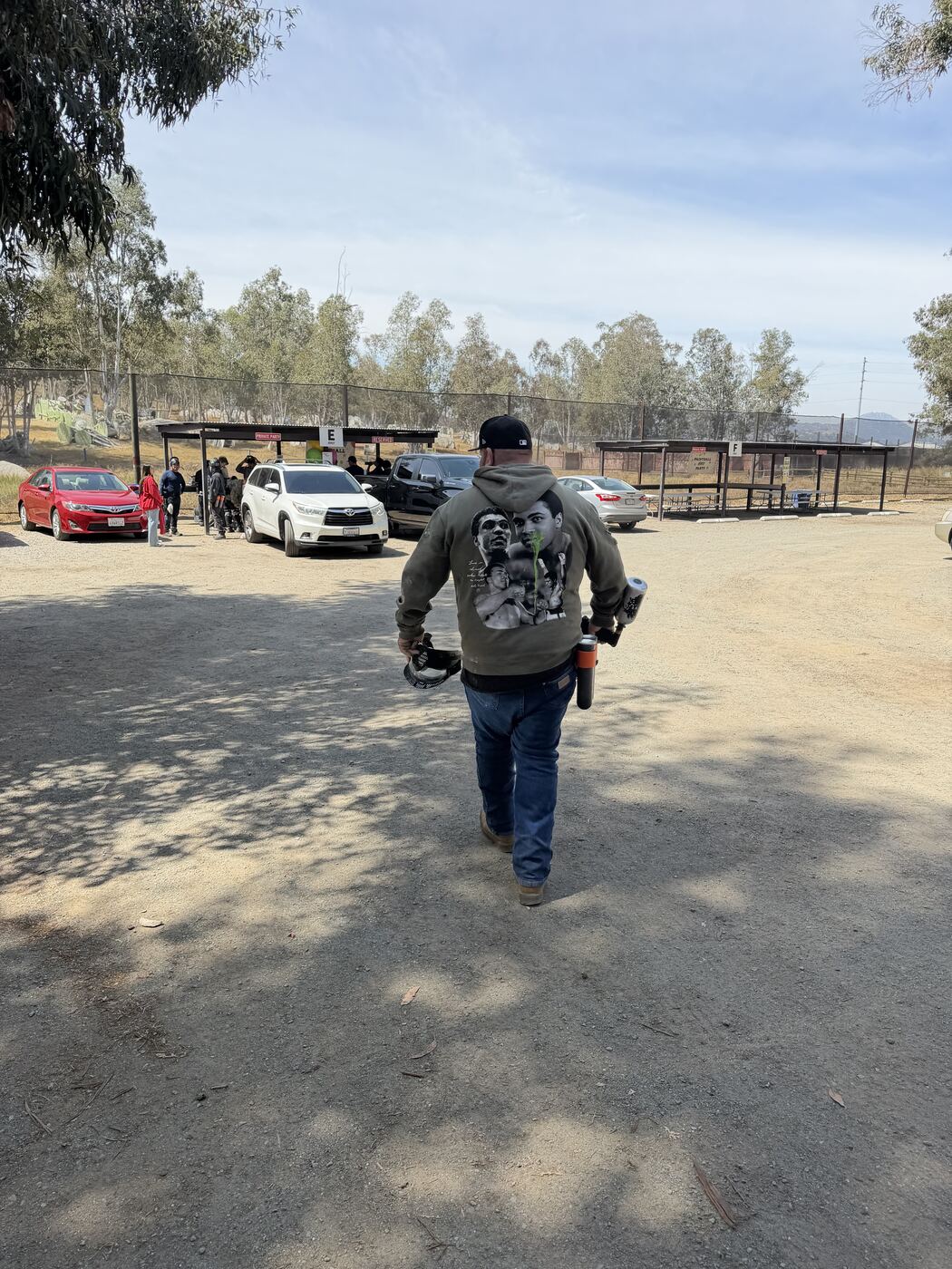 Walking up to the field — Ali hoodie, marker by the side