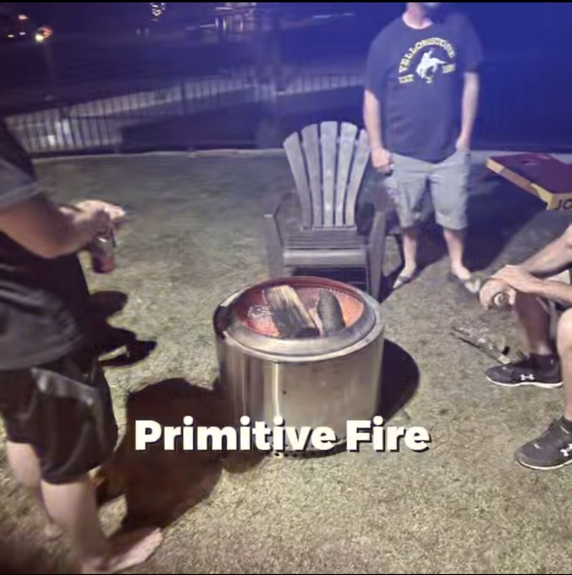 Solo stove glowing on the patio — primitive fire, modern company